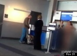 s-WOMAN-STRIPS-AT-AIRPORT-large