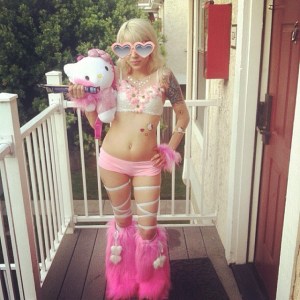 A rave girl in fluffies and leg wraps. Source: iHeartRaves' Instagram.