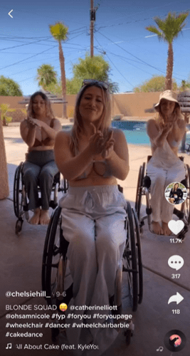 A screenshot of Chelsie Hill, a dancer, dancing in her wheelchair along with two friends also dancing in their wheelchairs.